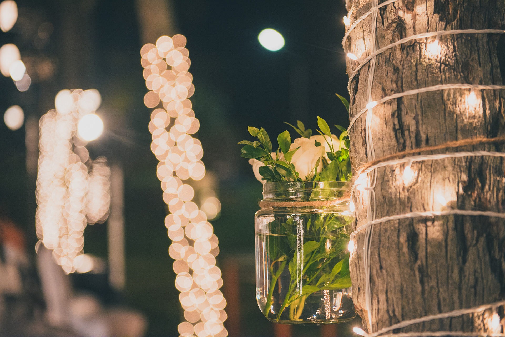 Warm delicate lights are the perfect wedding decor additions