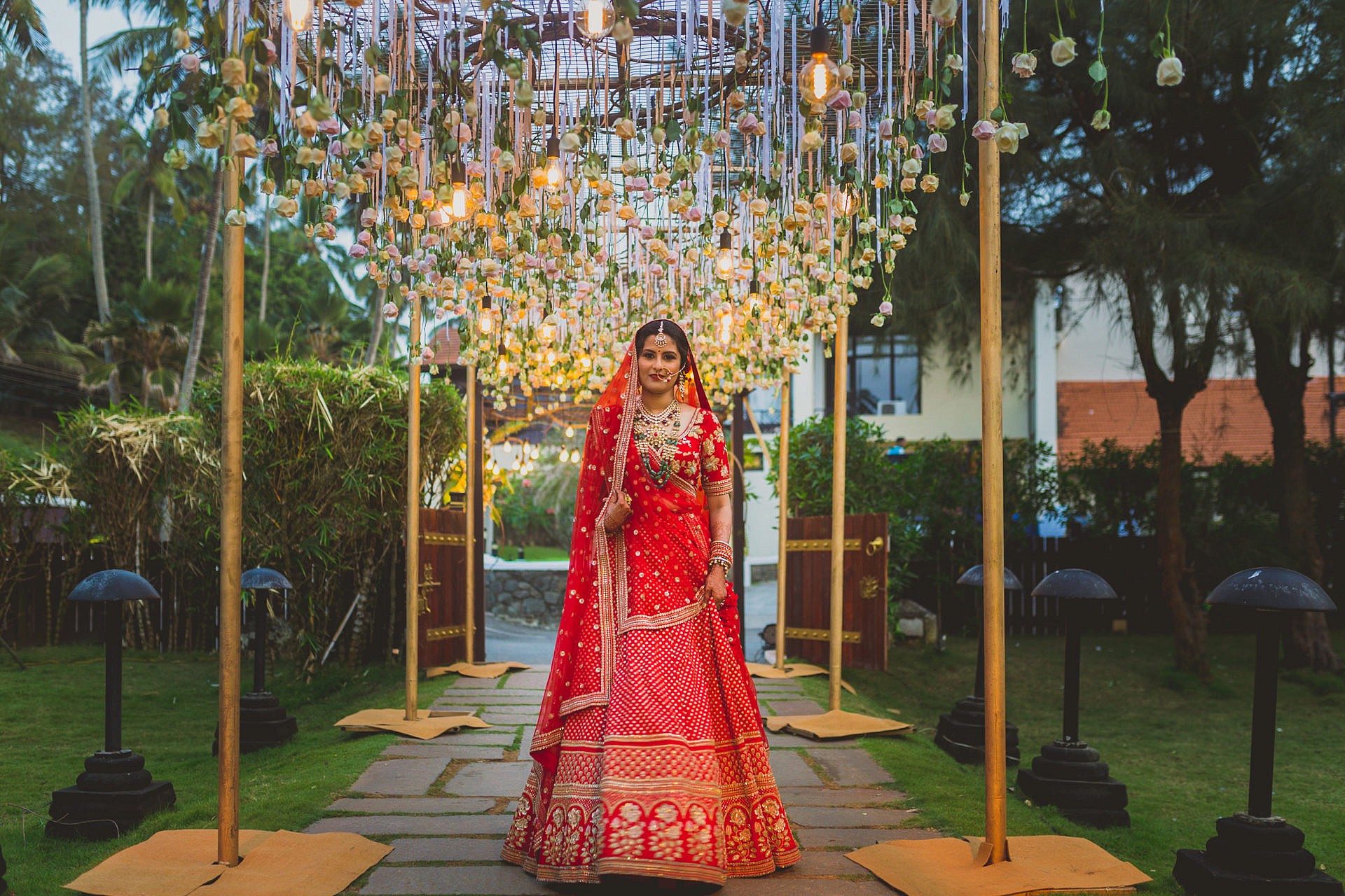A bride's royal welcome with beautiful lights glimmering above