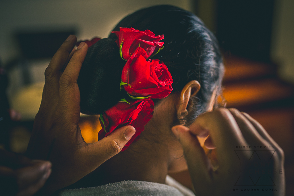 Bride's hair with roses at indian wedding