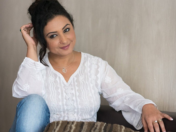 Divya Dutta in White Kurta and Jeans smiling