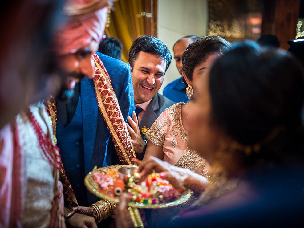 groom's welcome with tilak by bride's family