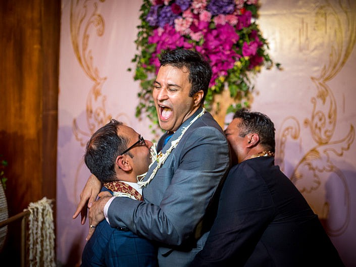 brother having fun with friends at indian wedding