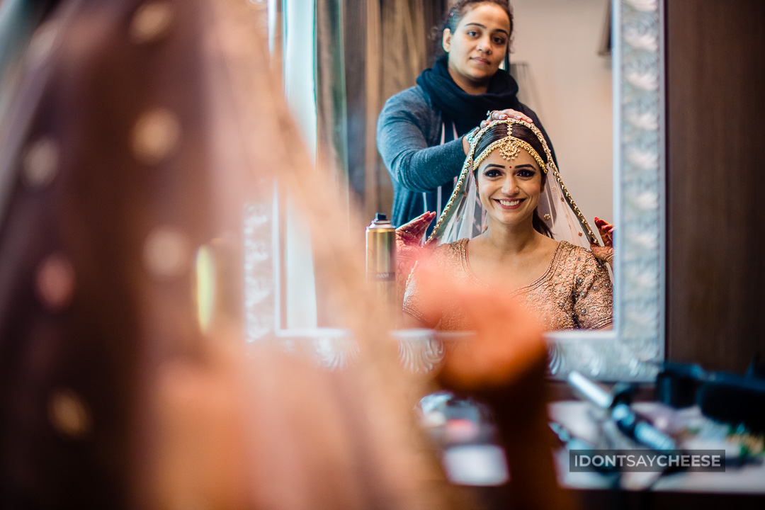 candid wedding photography of a bride getting ready
