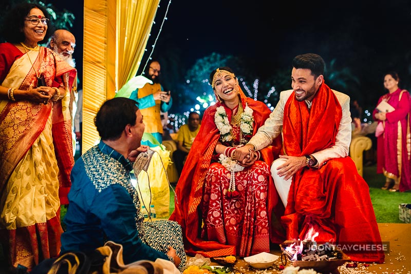 couple sitting in mandap at indian wedding